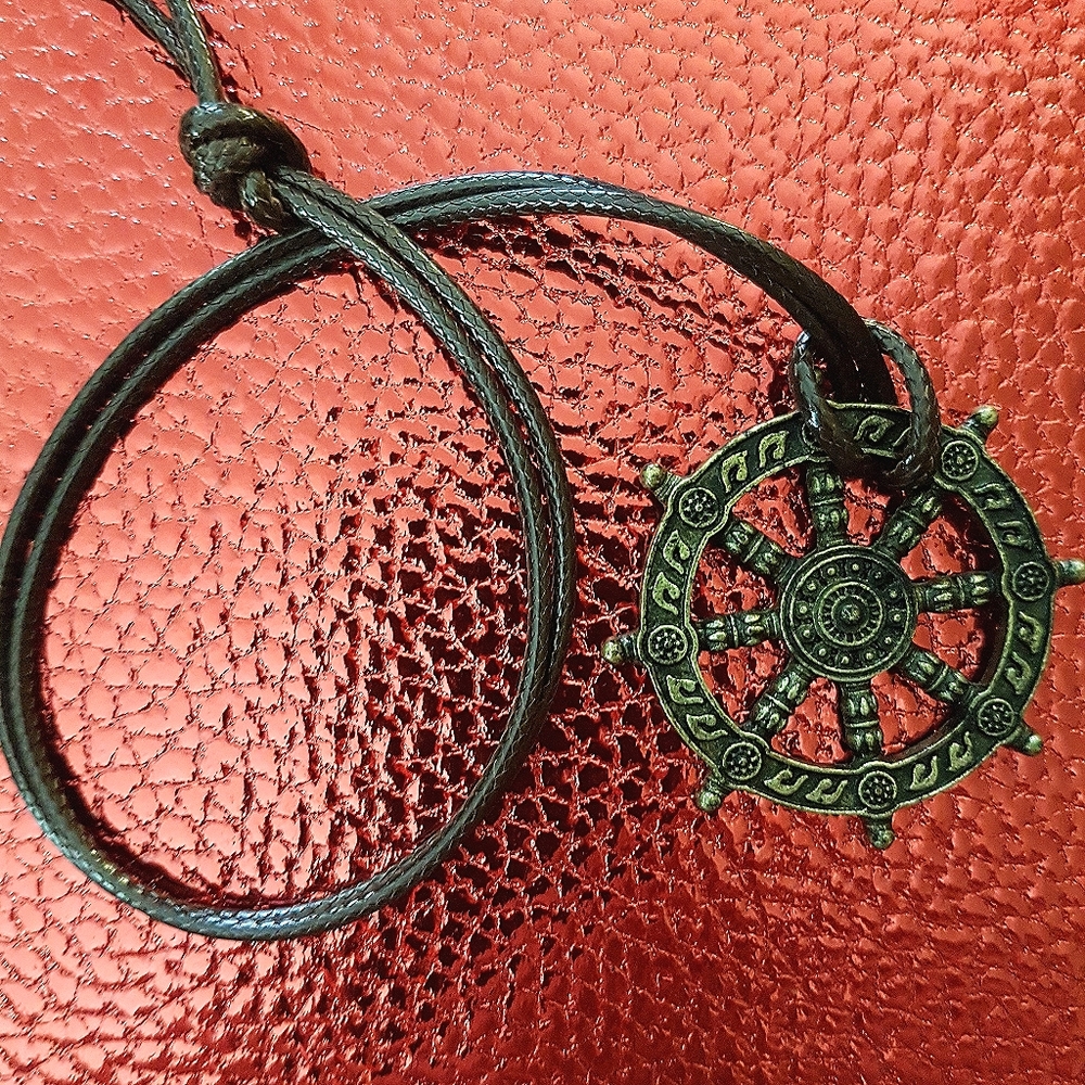 Dharma Wheel of life necklace, never worn.